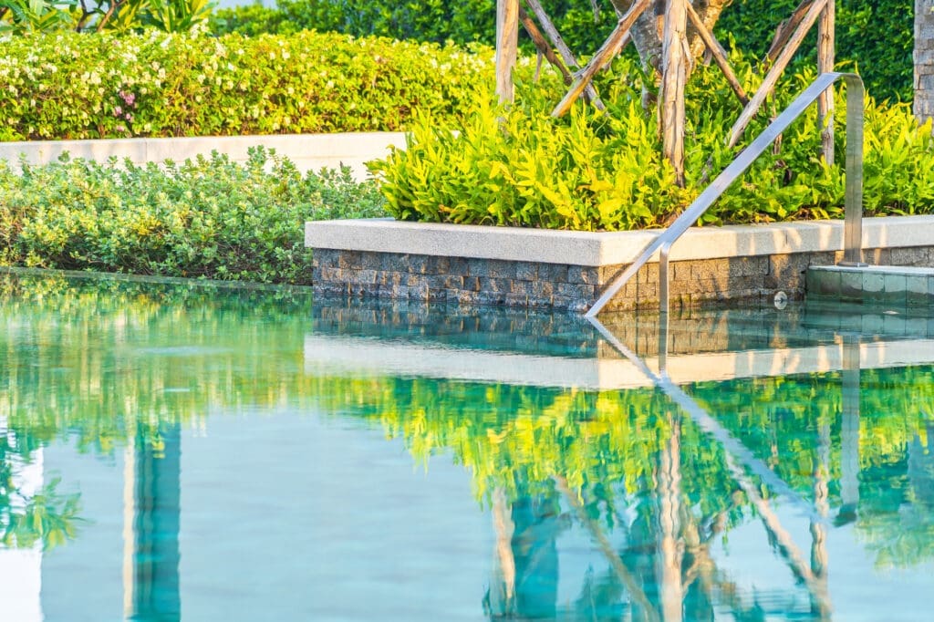 Natural Harmony: The Garden Pond Swimming Pool Design