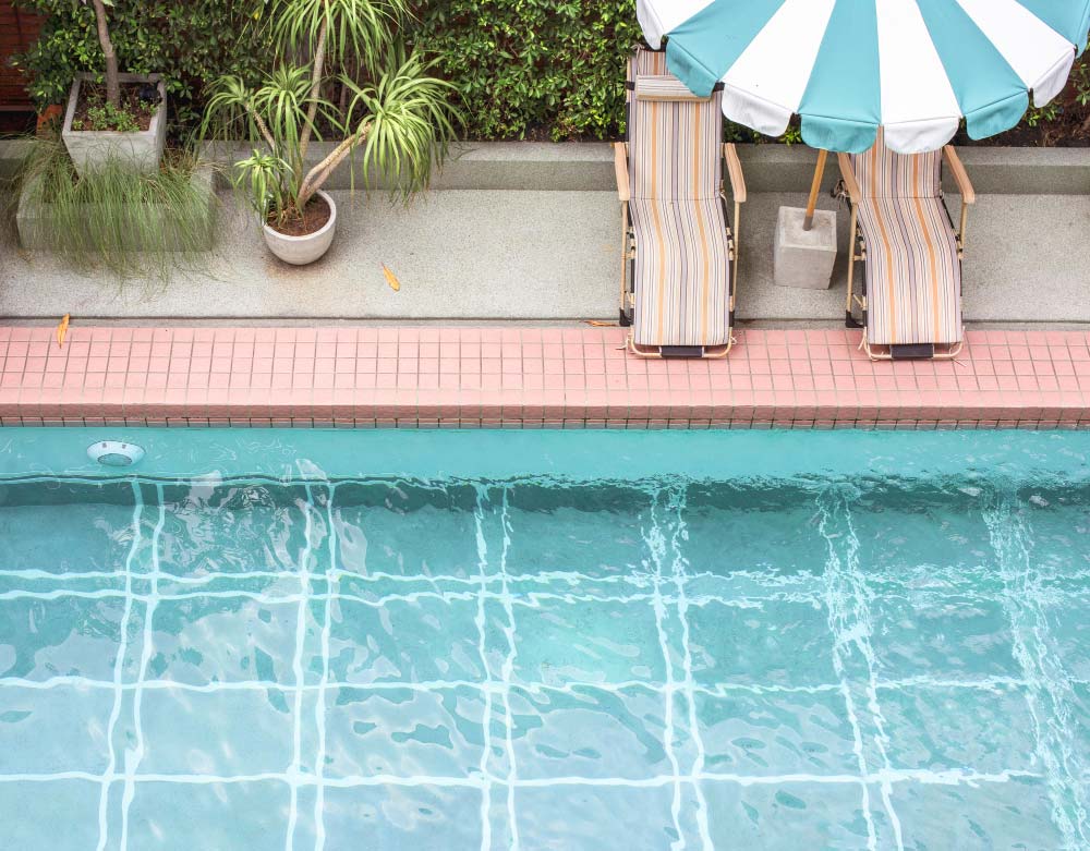 Urban Elegance: The Industrial Chic Swimming Pool Design