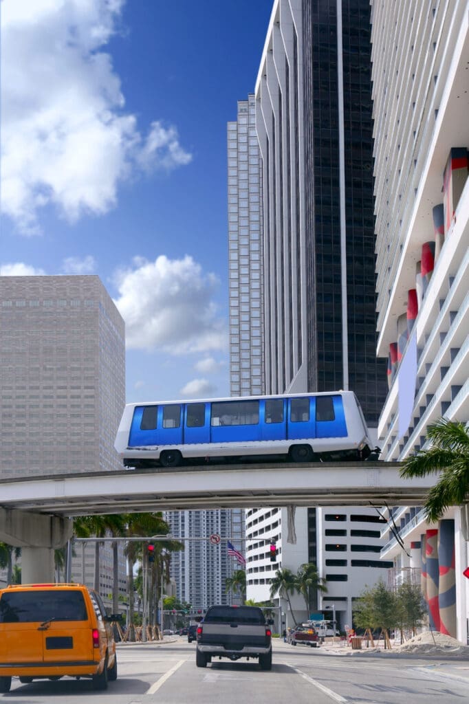 Downtown Miami's skyscrapers and buildings with the Metromover prominently in the foreground