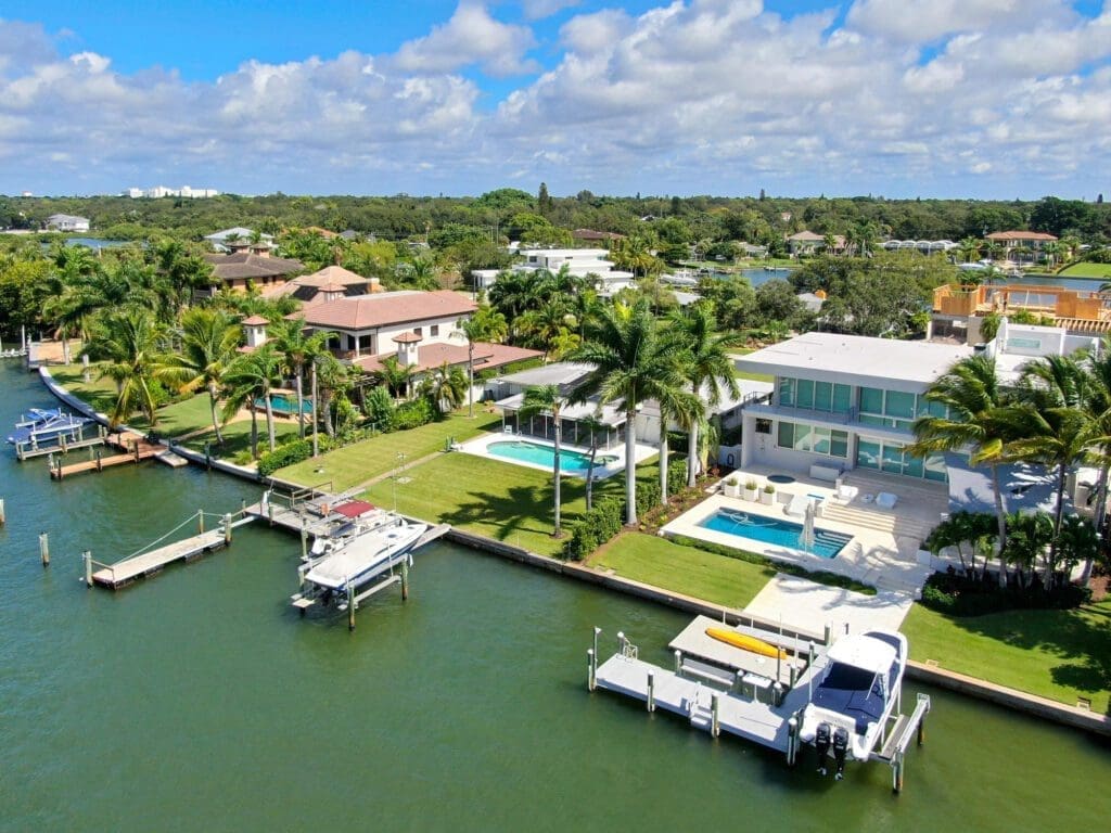 Aerial view of luxury villas with private boats in Bay Island, Sarasota