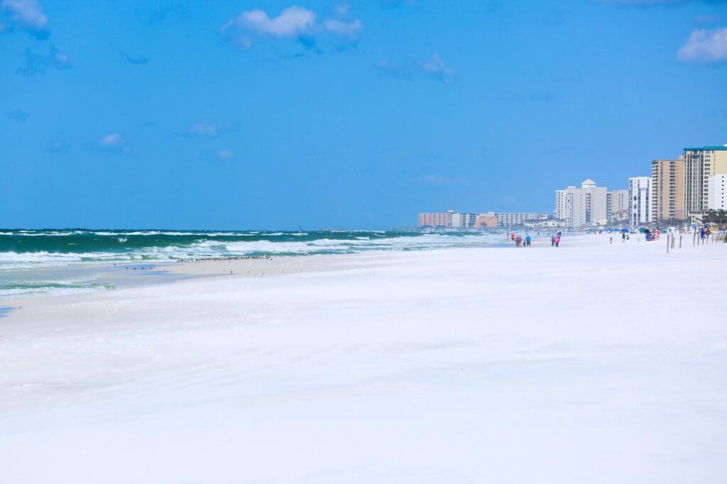 Scenic beach view under a blue sky in Destin, FL