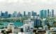 Aerial view of Miami's downtown office district on a bright, sunny day, showcasing towering commercial and residential skyscrapers