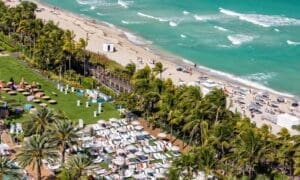 Breathtaking aerial perspective showcasing the Fontainebleau, Miami Beach Boardwalk, and the pristine coastline