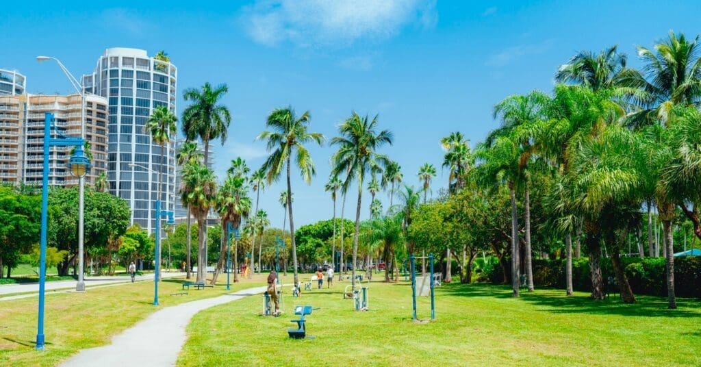 City park with trees and people in Coconut Grove