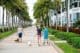 People strolling along the road in the picturesque South of Fifth area by the Miami Beach Marina