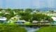 Aerial view of rural private houses in remote suburbs located near Florida wildlife wetlands