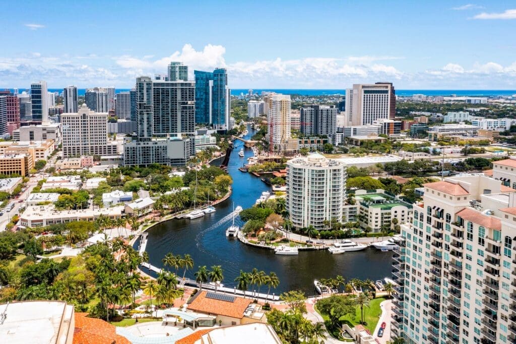 Aerial Drone Photoshoot: Luxury Homes and Buildings in Fort Lauderdale, Featuring Turquoise Waters, Sky, and Canals