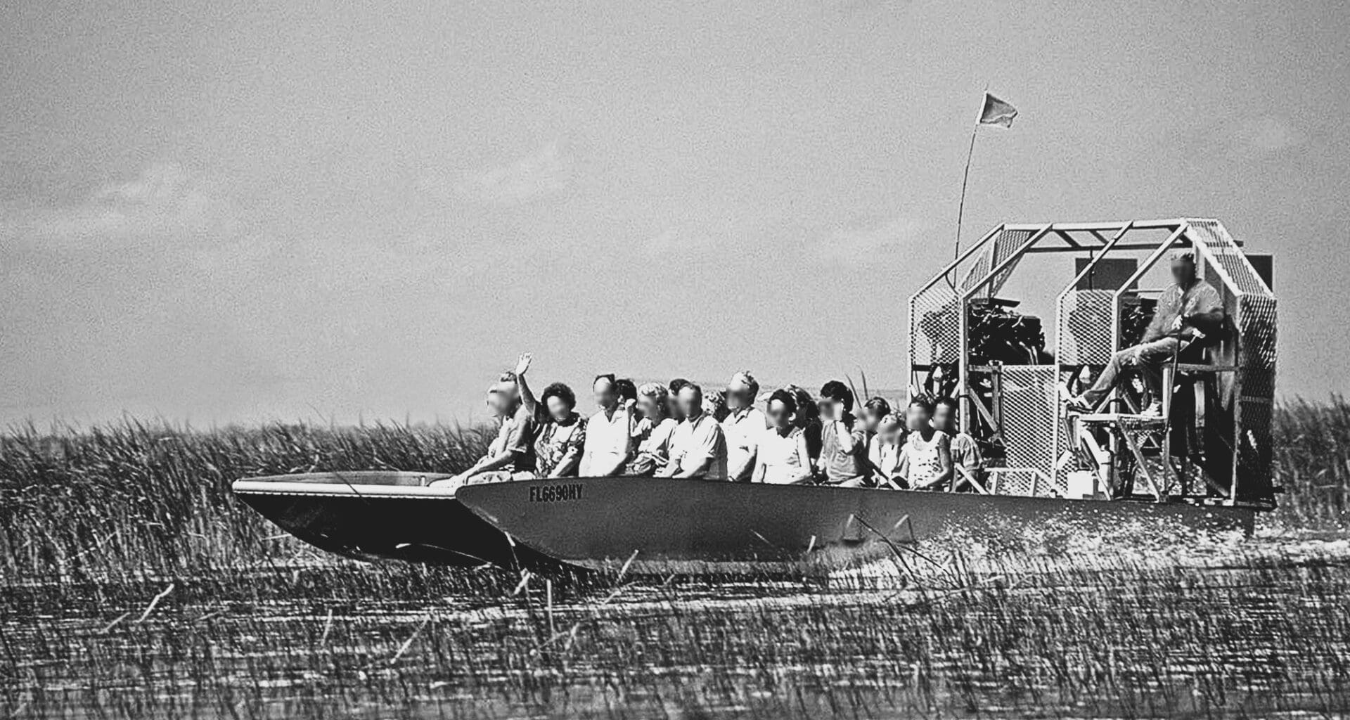 People navigating the swamps of the Seminole region in an airboat