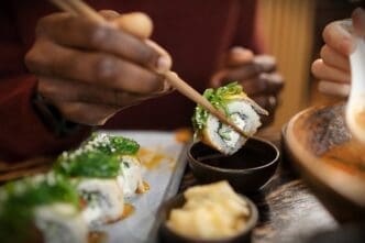 Someone savoring Japanese cuisine at a restaurant in Kyoto