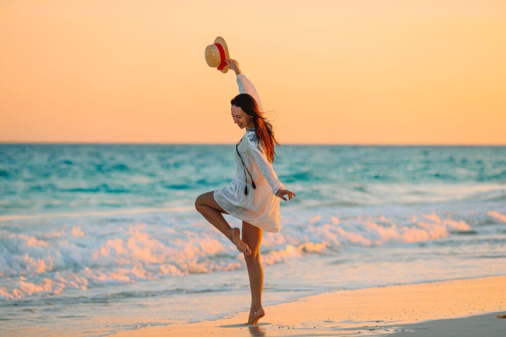 Young Woman Enjoying a Sunset on a South Florida Beach