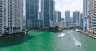 Aerial view of the Miami River with the stunning Miami skyline as a backdrop