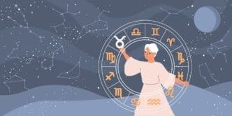 A stylized illustration of a white-haired woman in a light-colored dress, holding a glowing circular astrological chart with zodiac symbols, against a dark blue background with various constellations and a large moon.