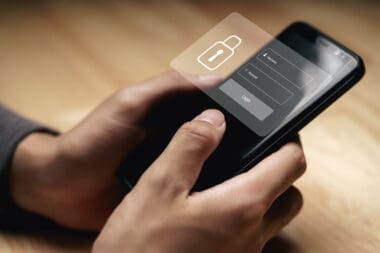 Businessman Secures Personal Data on Smartphone Using Login Virtual Interfaces