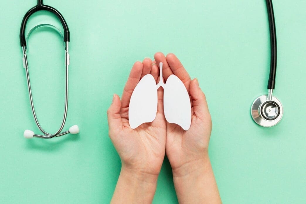 Hands shaped like lungs, representing the concept of the respiratory system