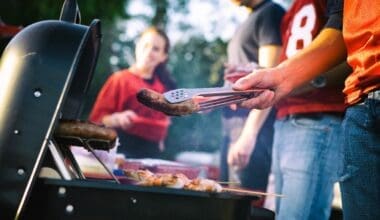 People getting ready to cook on a barbecue grill