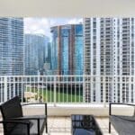 Pictures taken from the balcony of a residential building in Brickell, showcasing the stunning skyline overlooking the Miami River