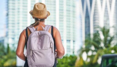 Snapshot of a tourist woman exploring the city’s skyscrapers in Miami