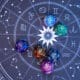 Top view of a zodiac horoscope circle accompanied by divination dice