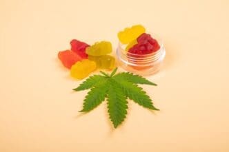 Variety of THC-infused jelly candies and green leaf recreational cannabis products