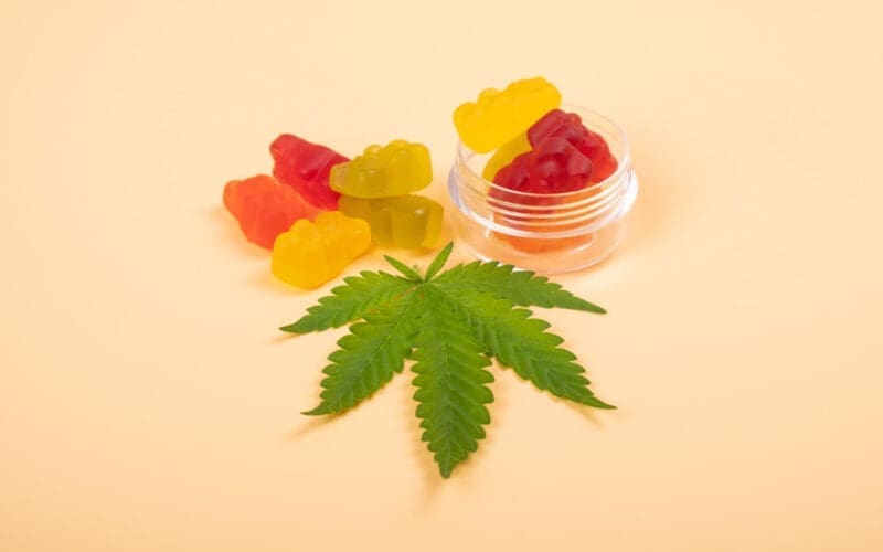 Variety of THC-infused jelly candies and green leaf recreational cannabis products