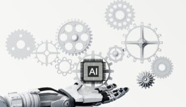 Web banner featuring an artificial intelligence theme with a processor chip and a robotic hand