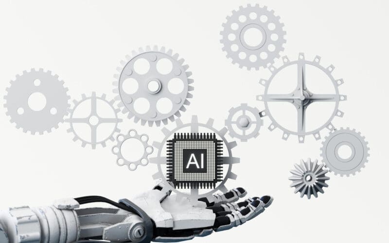 Web banner featuring an artificial intelligence theme with a processor chip and a robotic hand