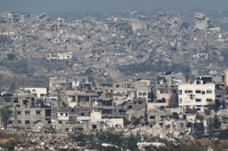 A view of damaged buildings in the northern Gaza Strip as seen from the Israel side of the border, near Sderot