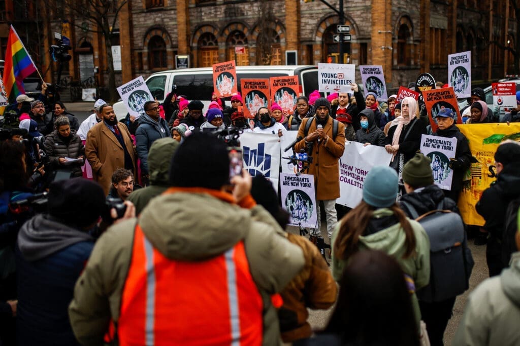 New York City Public Advocate Jumaane Williams speaks to people as they rally against Trump's policy of immigration in New York