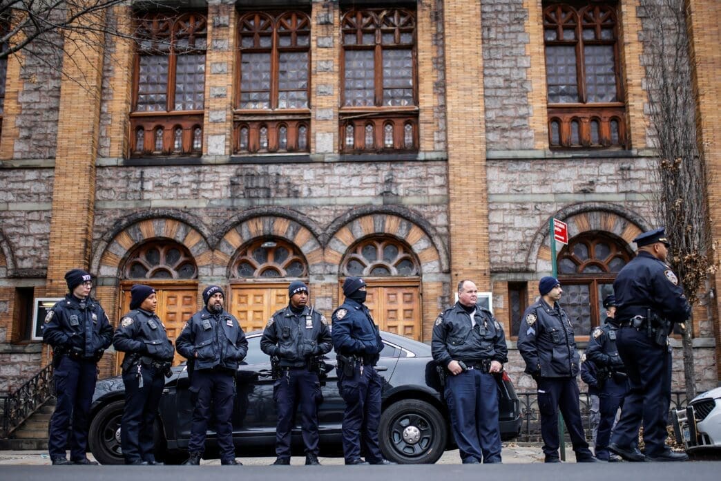 People take part in a rally against the Trump’s policy of immigration in New York