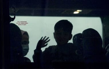 Afghan refugees arrive at Dulles Airport in Virginia
