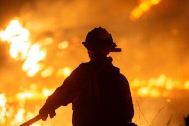 Firefighters and aircraft battle the Hughes Fire near Santa Clarita