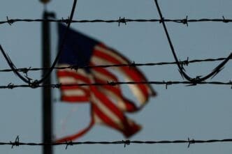 Migrants are transferred to a plane to be expelled from U.S., in El Paso