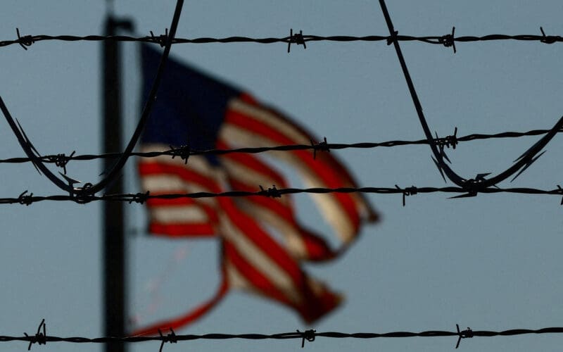 Migrants are transferred to a plane to be expelled from U.S., in El Paso