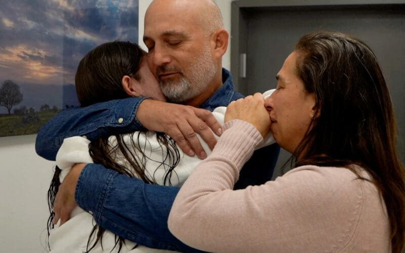 Former Israeli hostage embraces loved ones after being released from Gaza