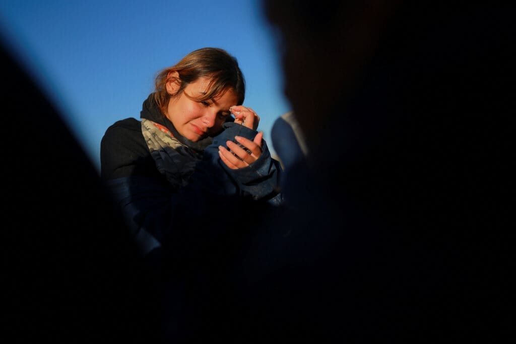 Migrants seeking asylum in the United States gather on the banks of the Rio Bravo river during a cold day in Ciudad Juarez