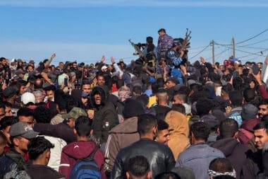 Displaced Palestinians wait to be allowed to return to their homes in northern Gaza, in the central Gaza Strip