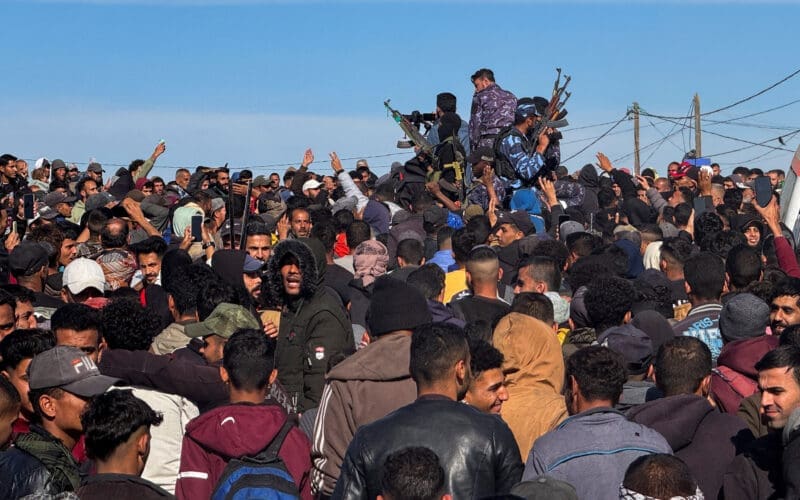 Displaced Palestinians wait to be allowed to return to their homes in northern Gaza, in the central Gaza Strip