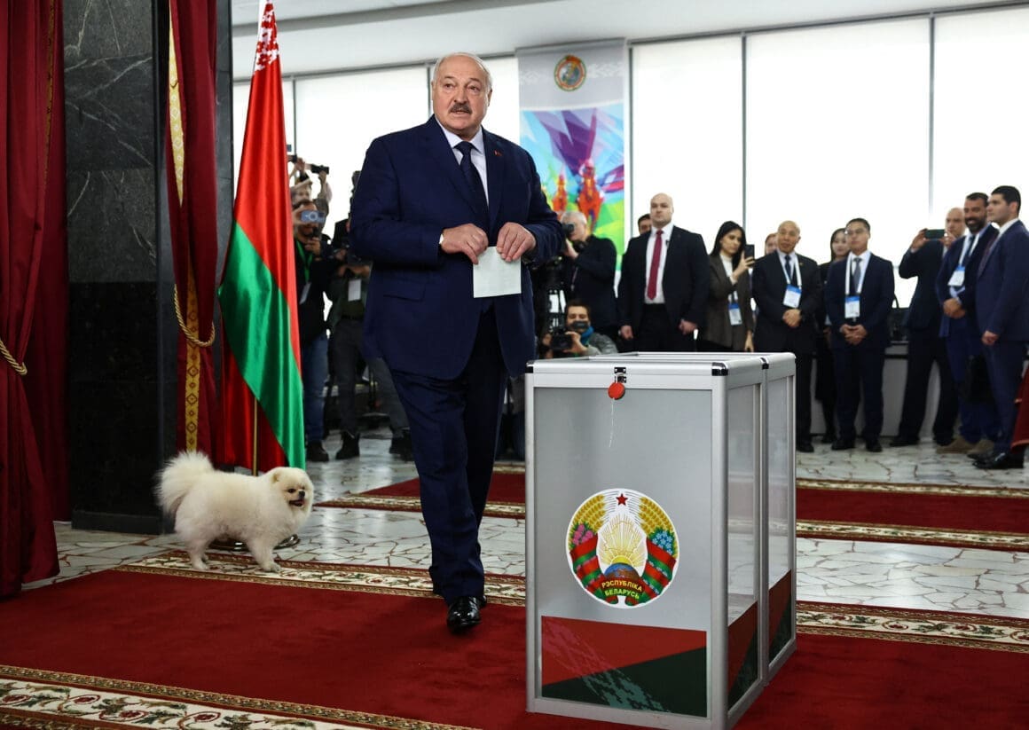 Belarusian President Alexander Lukashenko votes during the presidential election in Minsk