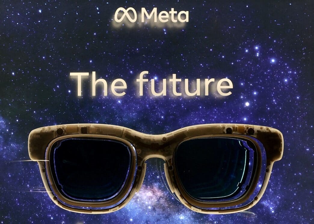 An advert for Meta's AR glasses Orion is seen at the entrance of the company's House in Davos