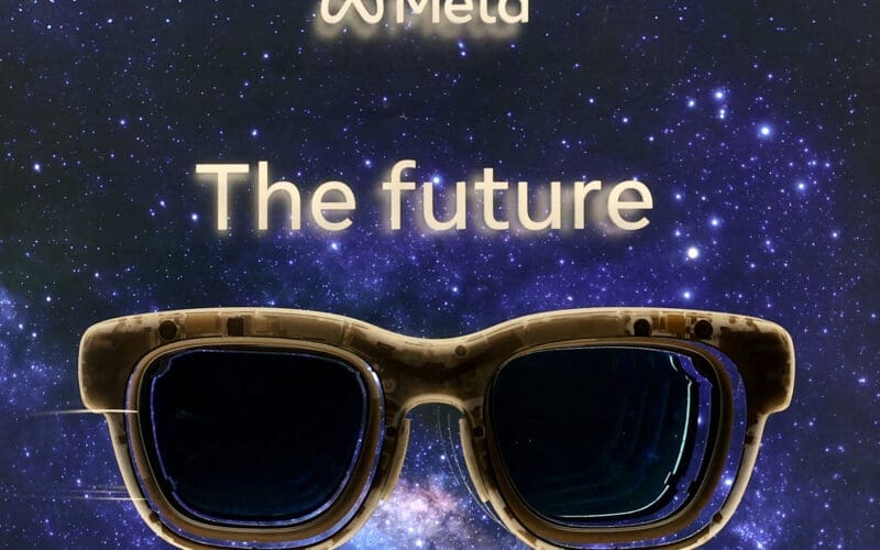 An advert for Meta's AR glasses Orion is seen at the entrance of the company's House in Davos