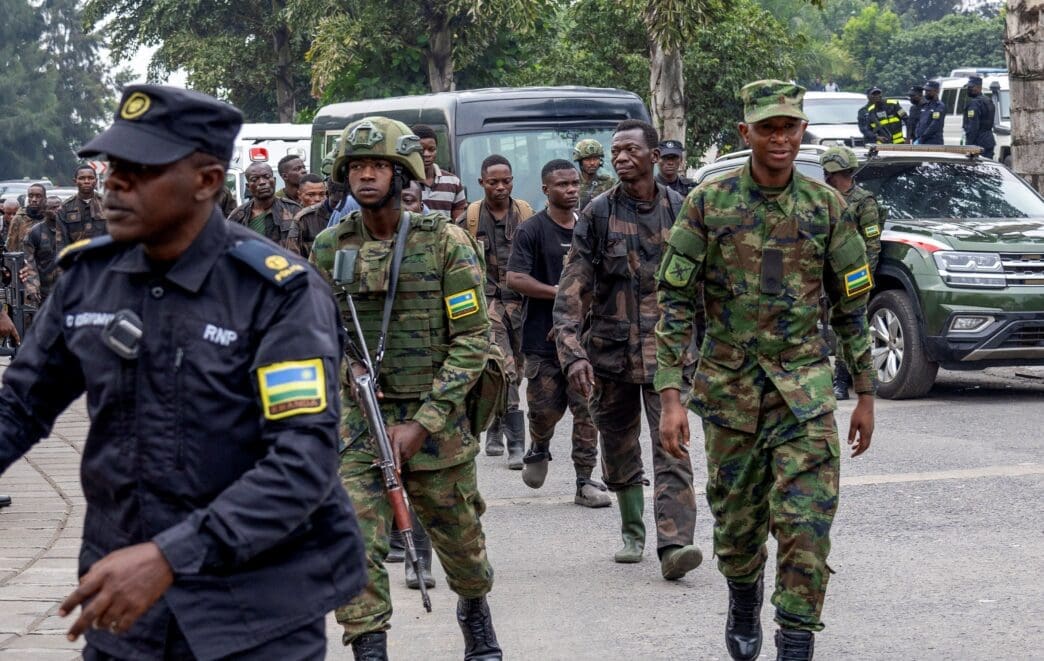 Rwandan security officers receive FARDC soldiers who surrendered in Goma