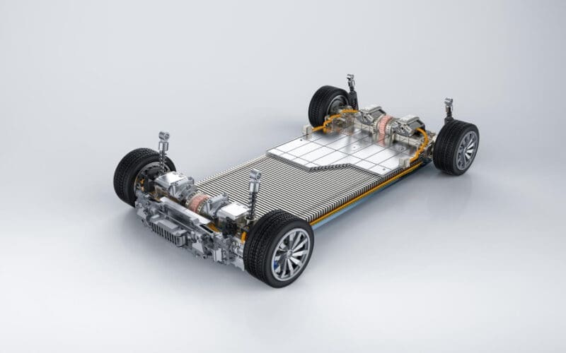 3D rendering of an electric vehicle battery featuring a module of battery cells displayed on a platform