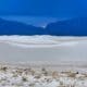 A picturesque view of White Sands National Monument set against the sky at sunset