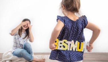 A sweet little girl celebrates her mother