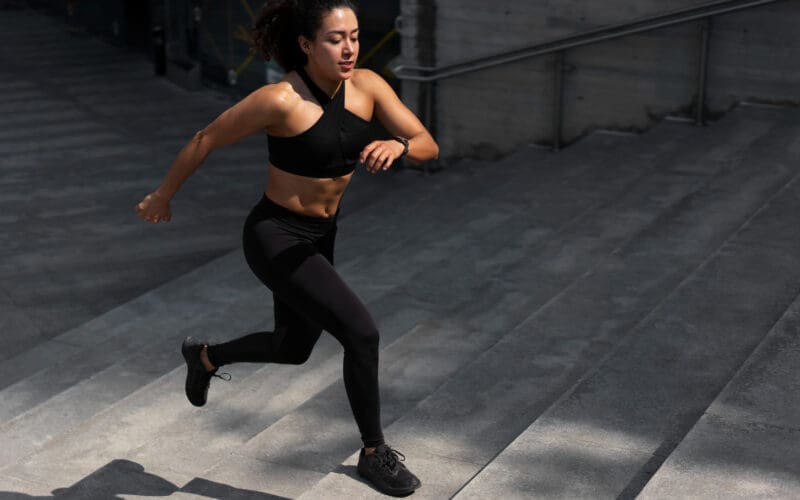 An athletic woman exercising outdoors