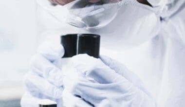 Close-up of a scientist examining asteroid samples