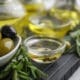 Composition with healthy olives and oil on kitchen table