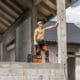 Construction Worker Posing Inside Newly Built Residential Home