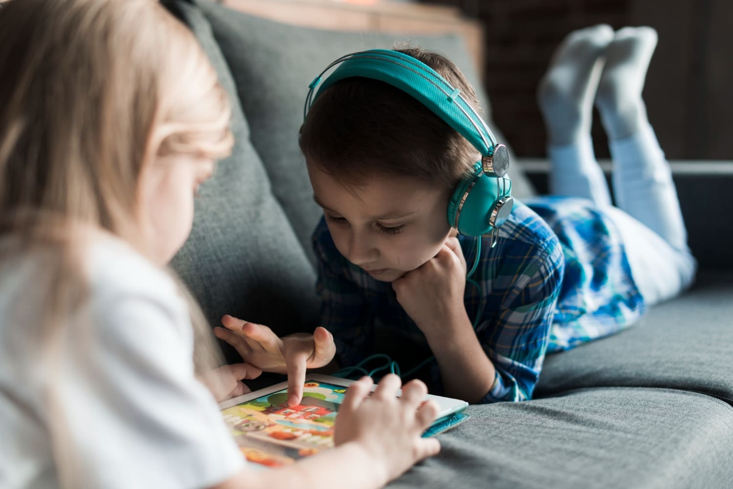 Kids playing with tablets