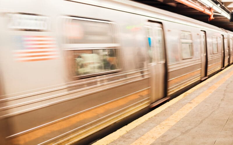 New York Metro train arriving at the railway station.